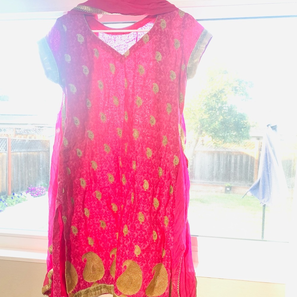 Bright pink and golden Kurta with dupatta (scarf)